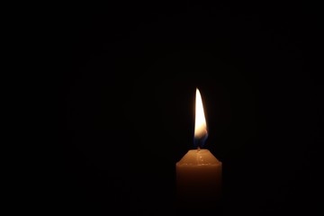 Candle black background of mourning funeral moment of silence	