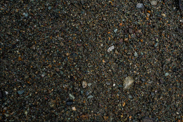 The texture of a shallow river stone. Pebble Background Image