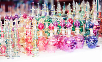 Obraz na płótnie Canvas multicolored glass vintage oriental bottles for perfume or aromatic oils