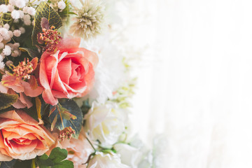 Artificial flowers decoration background in vintage classic tone color