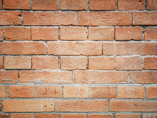 Brick wall background. Brown and red bricks, masonry texture of a building exterior