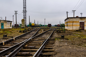 Fototapeta na wymiar Many cargo trains at the sorting railway station