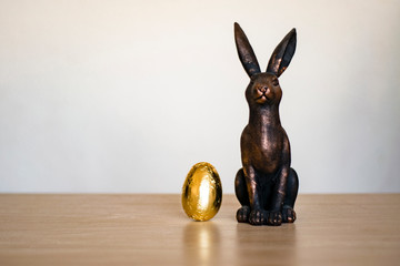 golden easter egg and rabbit