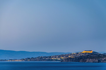 The old traditional village of Molivos with the medieval castle  in Mythimna Lesvos Greece at dusk night