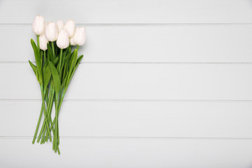 White tulips bouquet with copy-space