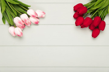 Pink and red tulips bouquet with copy-space