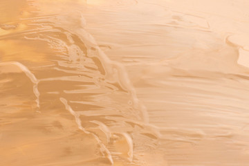 Liquid foundation texture. Make up for women.