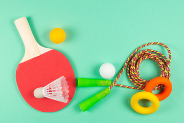 Sport equipment on green background.
