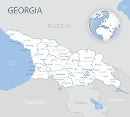 Blue-gray detailed map of Georgia and administrative divisions and location on the globe. Vector illustration