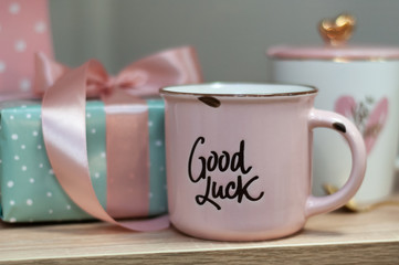 cup of coffee with milk and cookies on wooden background