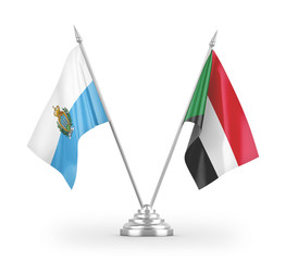 Sudan and San Marino table flags isolated on white 3D rendering