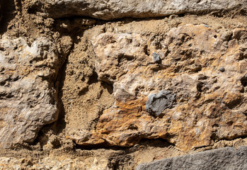 Stones as bricks in the wall as abstract background