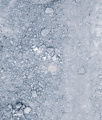 Dry mix of cement on the ground.