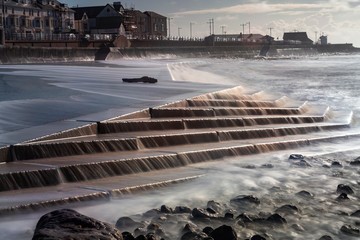 The recently built sea defences at Porthcawl in South Wales UK during the tail end of Storm Jorge