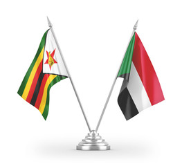 Sudan and Zimbabwe table flags isolated on white 3D rendering