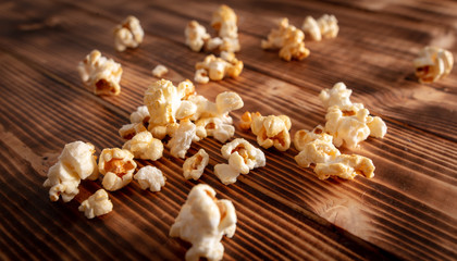 Popcorn flakes on a wooden background