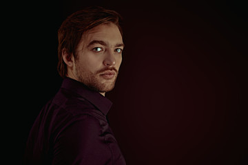 Fototapeta premium dark portrait of handsome man