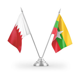 Myanmar and Bahrain table flags isolated on white 3D rendering