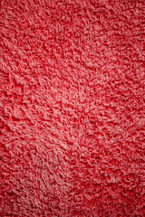 texture of bright pink Terry cloth in close-up with background blur
