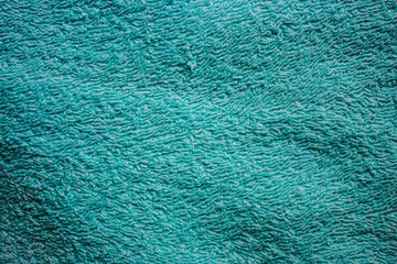 background of blue Terry towel texture close-up