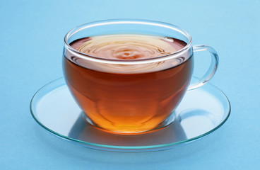 Cup of tea on a blue background.