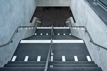 white markings to indicate to the blind and partially sighted a change of landing on the stairs of...