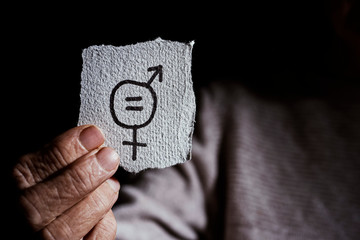 senior woman and symbol for gender equality