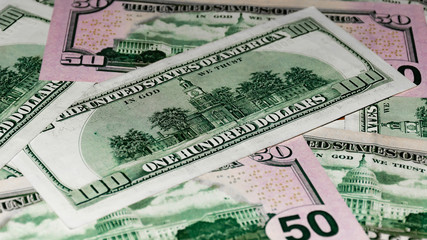 Heap of US dollars banknotes lying chaotically