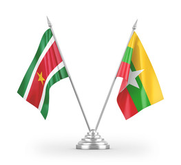 Myanmar and Suriname table flags isolated on white 3D rendering