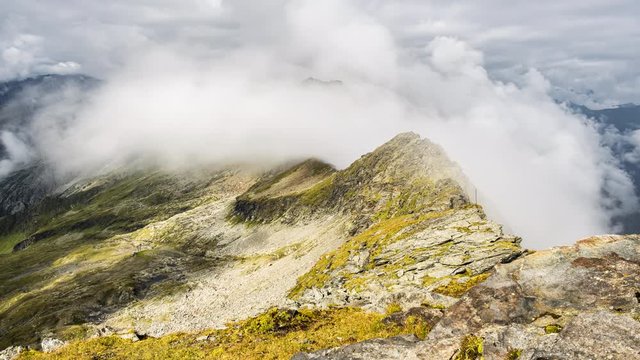 Timelapse of clouds at Kaple Arnoldh&ouml;he, High Tauern, Alps, Austria