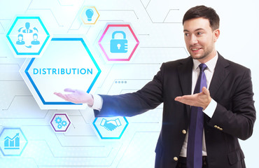 Business, Technology, Internet and network concept. Young businessman working on a virtual screen of the future and sees the inscription: Distribution