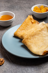 Pancakes with honey, healthy breakfast, brunch, food, morning eating. Macro.