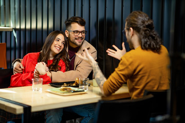 Young Friends at Fast Food Restaurant