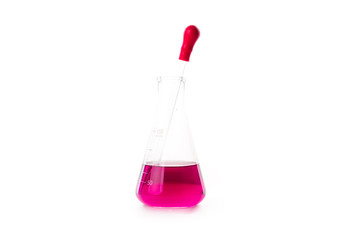red liquid in glass beaker