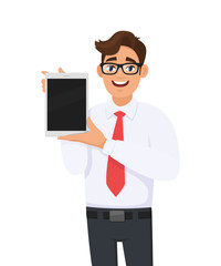 Cheerful young business man showing blank screen tablet. Trendy person holding digital tab. Male character design illustration. Modern lifestyle, digital technology concept in vector cartoon style.