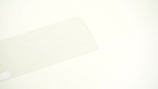 Closeup view of new protector glass for screens of modern smartphones. 