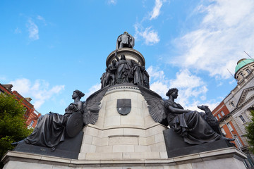 Fototapeta na wymiar The Daniel O 'Connell monument on O'Connell Street, Dublin, Ireland