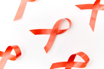 Red ribbon on background paper