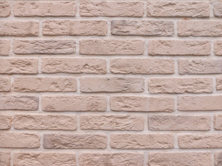 background of the wall is a brown brick surface. Abstract wall background.