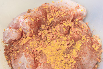 Raw pickled chicken with spicy spices.