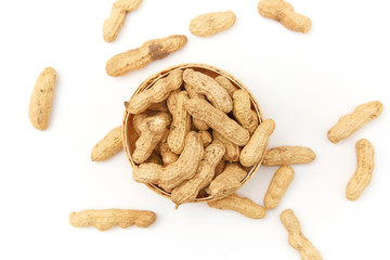 A pile of peanuts in a bamboo basket