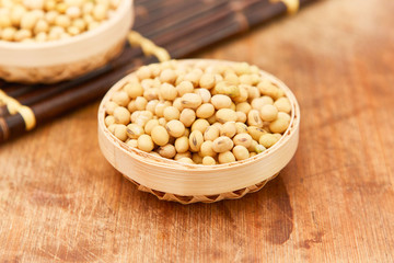 A pile of soybeans in a bamboo basket