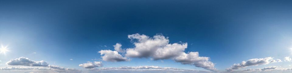 Seamless hdri panorama 360 degrees angle view blue sky with beautiful cumulus clouds with zenith for use in 3d graphics or game development as sky dome or edit drone shot
