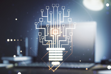 Creative light bulb with chip hologram on modern laptop background, artificial Intelligence and...