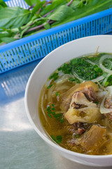 Famous Vietnamese cuisine - Pho beef noodle served with vegetable