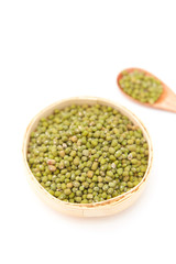 A pile of green beans in the bamboo basket