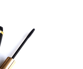 Beautiful advertising background design. The mascara and brush