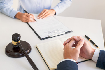 Male lawyer or judge consult with client check contract papers recommend legal proposals, Law services concept