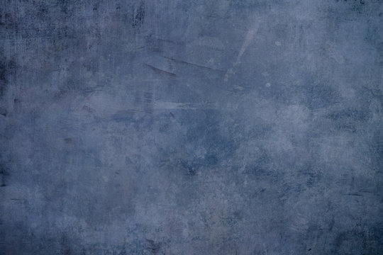 Dark blue grungy canvas background