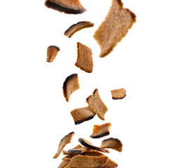 Rye croutons levitate on a white background